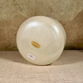 Load image into Gallery viewer, Round crystal sound bowl with a Crystal Tones brand label on a textured surface