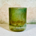 Load image into Gallery viewer, Green crystal sound bowl with 'Crystal Tones' branding on a textured surface.