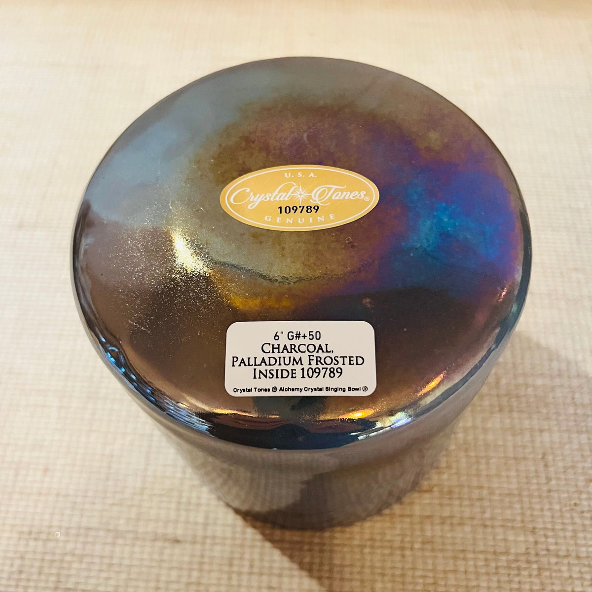 Crystal Tones® Charcoal Palladium bowl bottom view with descriptive sticker 