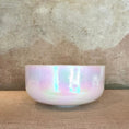 Load image into Gallery viewer, Iridescent crystal sound bowl on a textured surface with a neutral background

