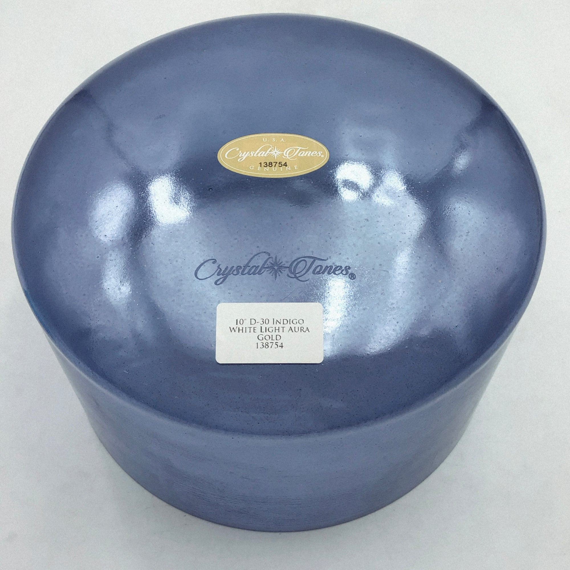 Blue crystal singing bowl with 'Crystal Tones' branding on a white background