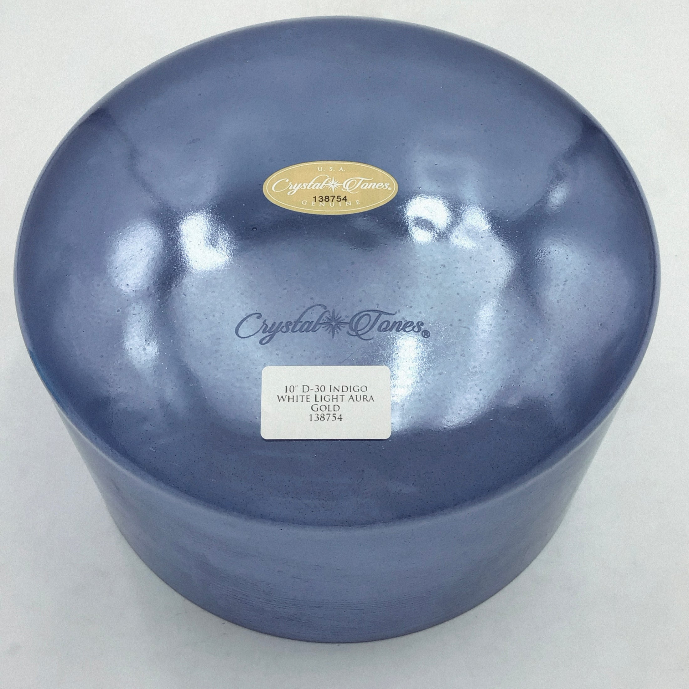 Blue crystal singing bowl with 'Crystal Tones' branding on a white background