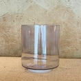 Load image into Gallery viewer, Smoky crystal sound bowl on a textured surface
