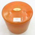 Load image into Gallery viewer, View of the base of a crystal sound bowl with labels on a white background
