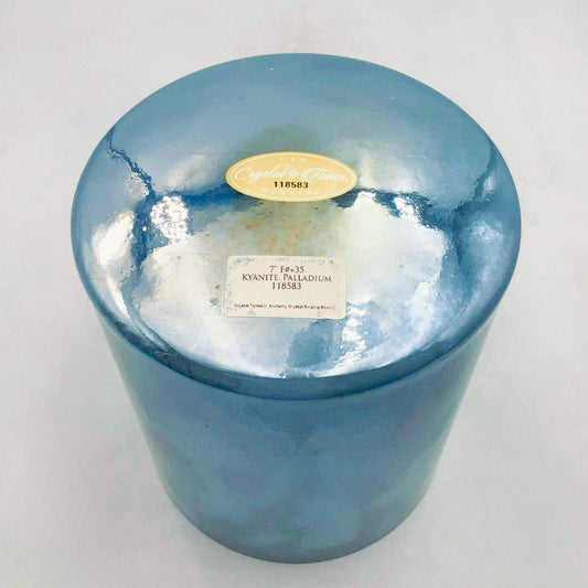 Blue crystal sound bowl with labels on a white background