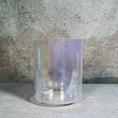 Load image into Gallery viewer, Iridescent crystal sound bowl on a textured surface
