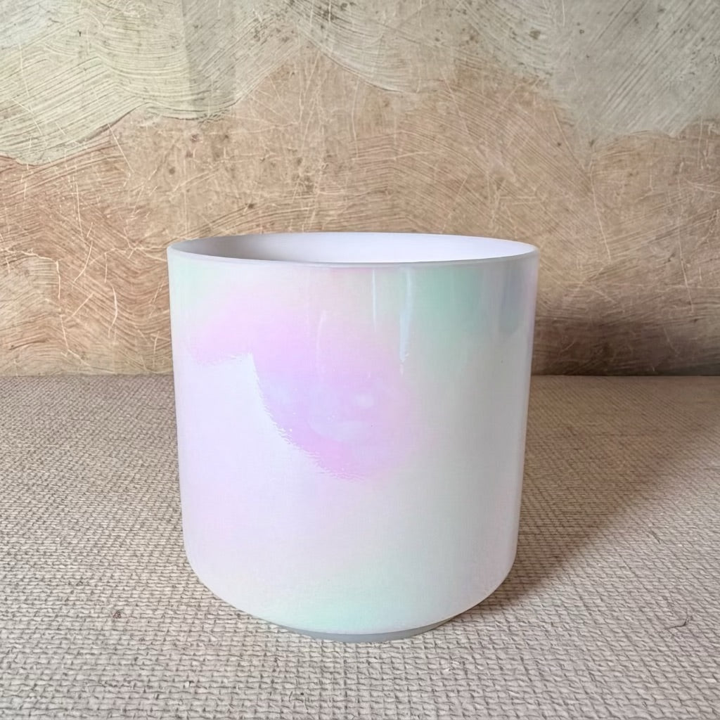 Front view of a 6-inch Crystal Tones® Mother of Platinum Alchemy™ crystal singing bowl in G# +45.
