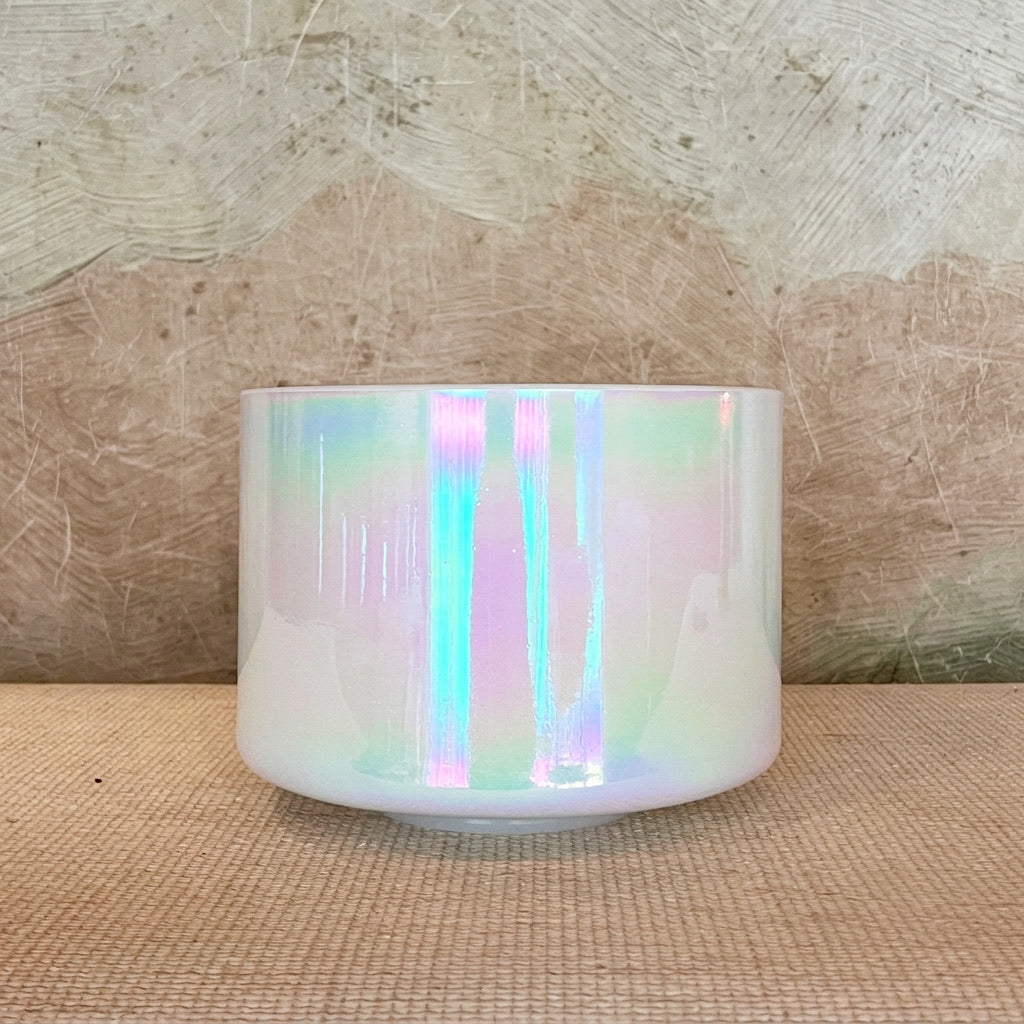 Front view of an 8-inch Crystal Tones® Mother of Platinum Alchemy™ crystal singing bowl in F# +35.