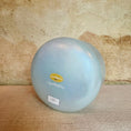 Load image into Gallery viewer, Base view of a 10-inch Crystal Tones® Ocean Gold Alchemy™ crystal singing bowl in D# +35.
