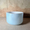 Load image into Gallery viewer, Front view of a 10-inch Crystal Tones® Ocean Gold Alchemy™ crystal singing bowl in D# +35.
